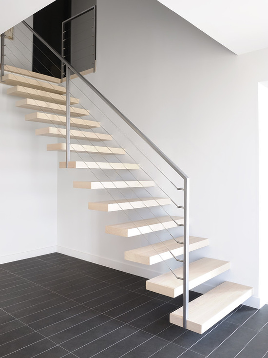 warm floating staircase with stainless steel cable balustrade 
