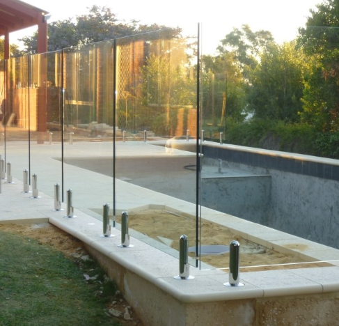 Full frameless pool fencing fixed to deck 