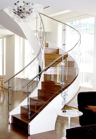 Spiral glass balustrade with 12mm curved acrylic panels 